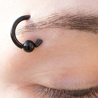 Eyebrow Piercing Rings – selection on linen